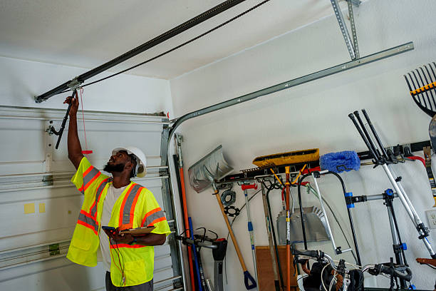Professional Garage Door Panel Replacement technician working in Spicer, MN